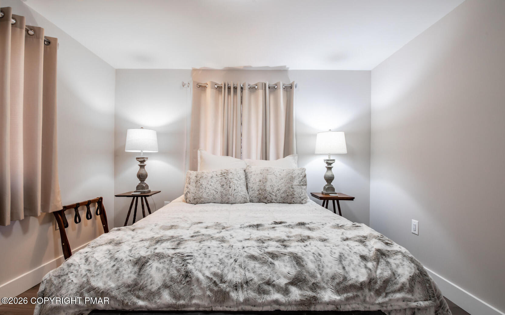 324 Remington Road East Stroudsburg, PA 18301 - Photo 23 of 35 a bedroom with a bed and a night stand