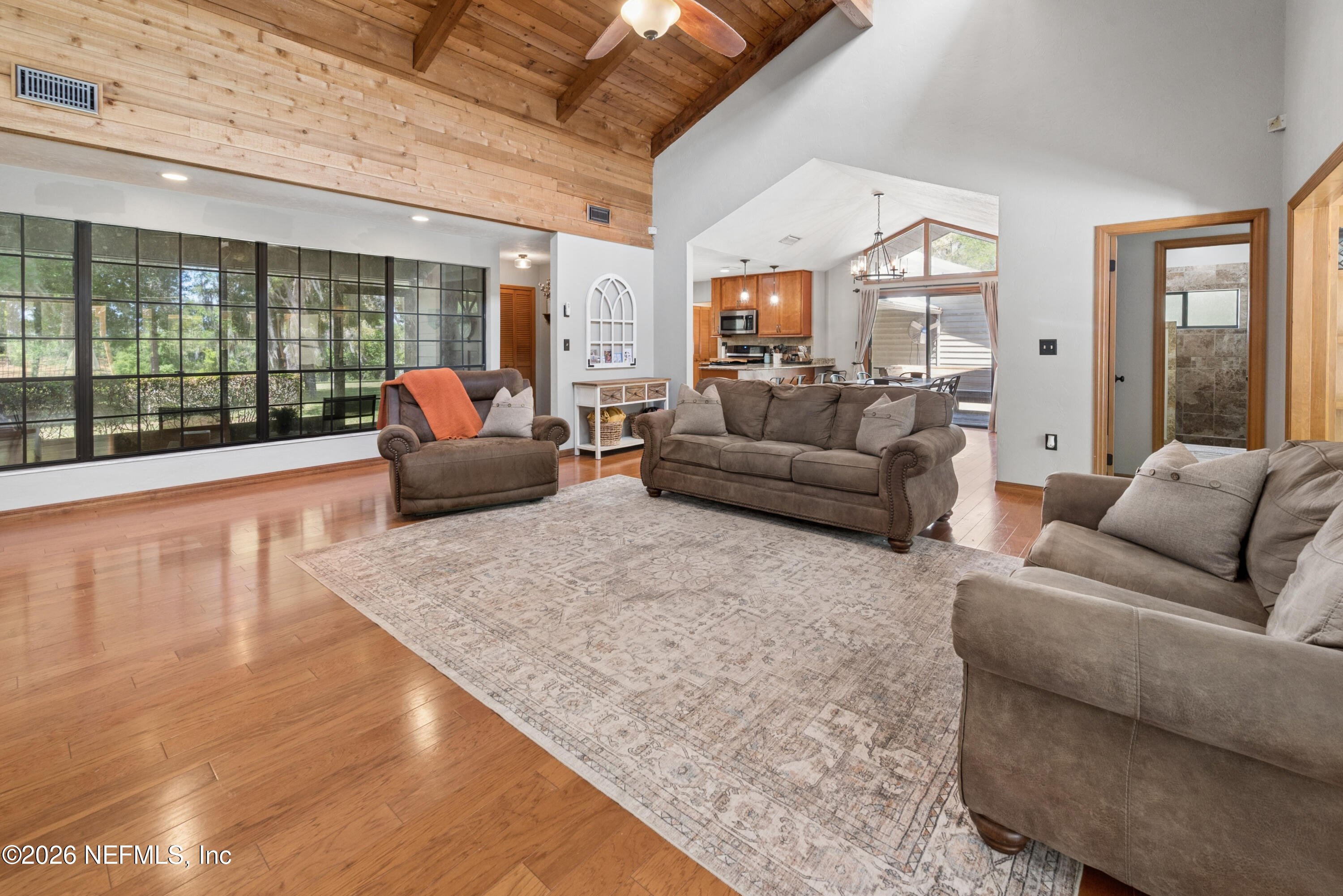 6519 Neale Road Melrose, FL 32666 - Photo 15 of 48 a living room with furniture and a large window