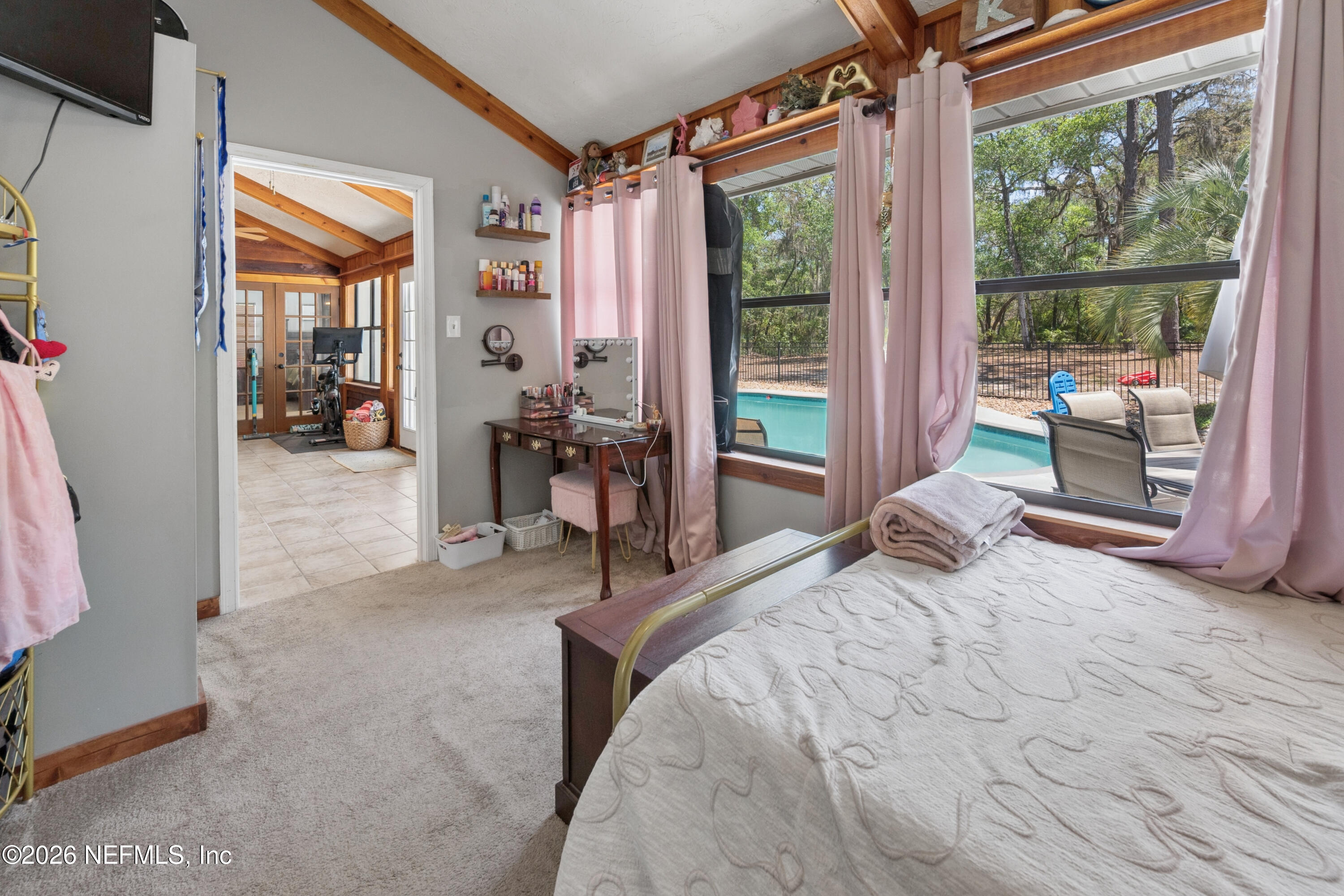6519 Neale Road Melrose, FL 32666 - Photo 28 of 48 a bedroom with a bed and large window