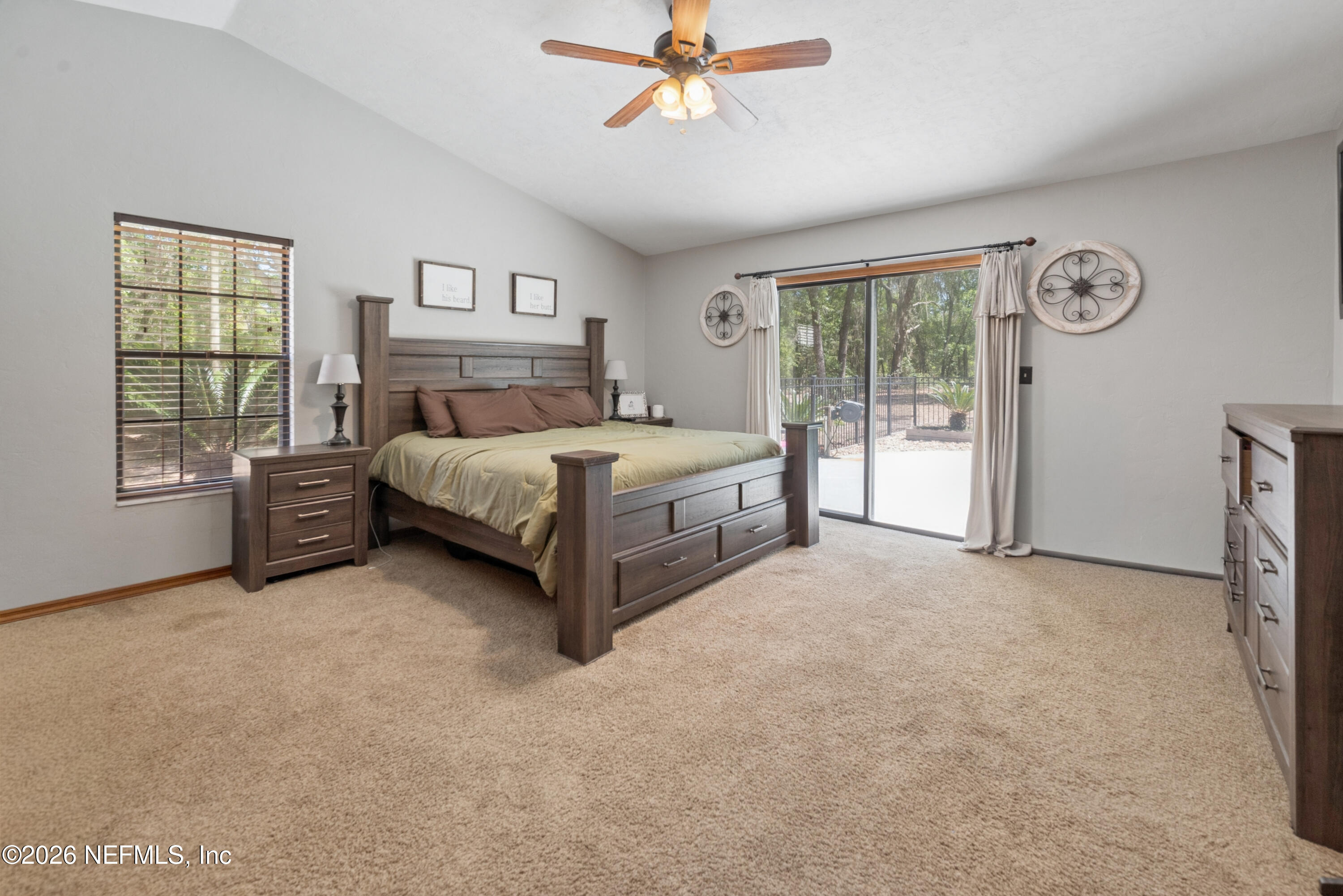 6519 Neale Road Melrose, FL 32666 - Photo 29 of 48 a bed room with a bed and a tv