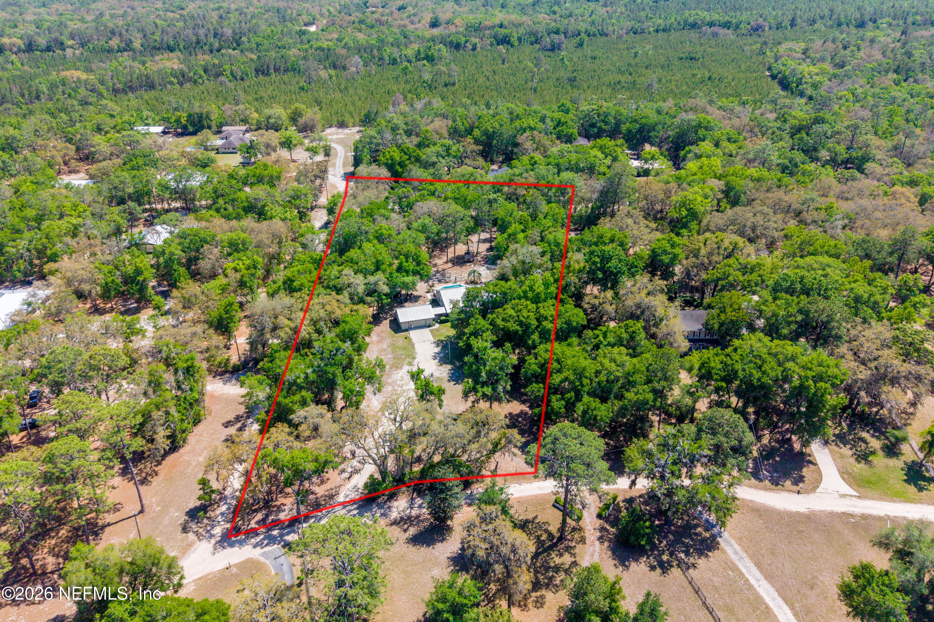 6519 Neale Road Melrose, FL 32666 - Photo 47 of 48 an aerial view of residential house with outdoor space and trees all around