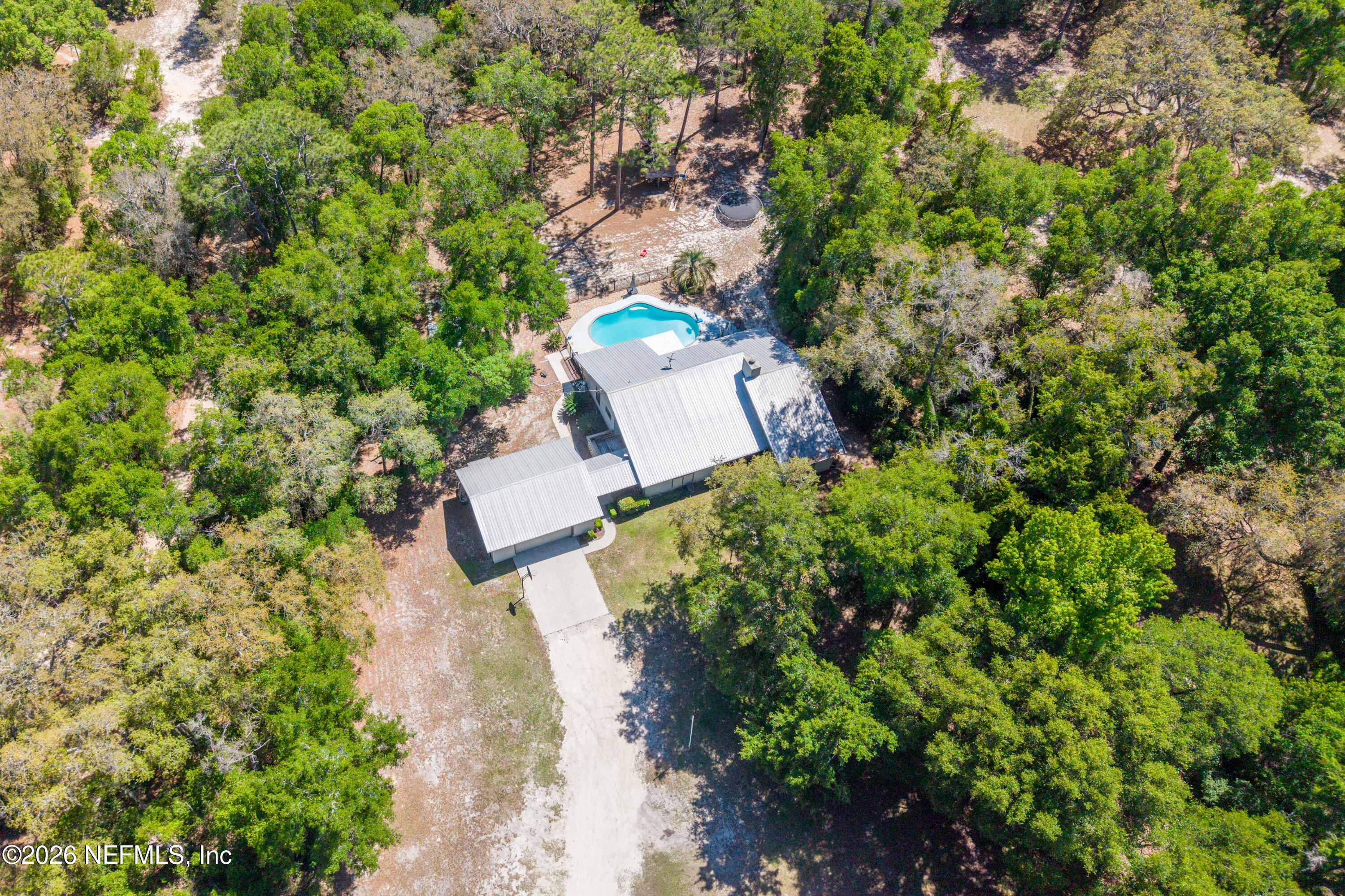 6519 Neale Road Melrose, FL 32666 - Photo 48 of 48 an aerial view of a house with a yard