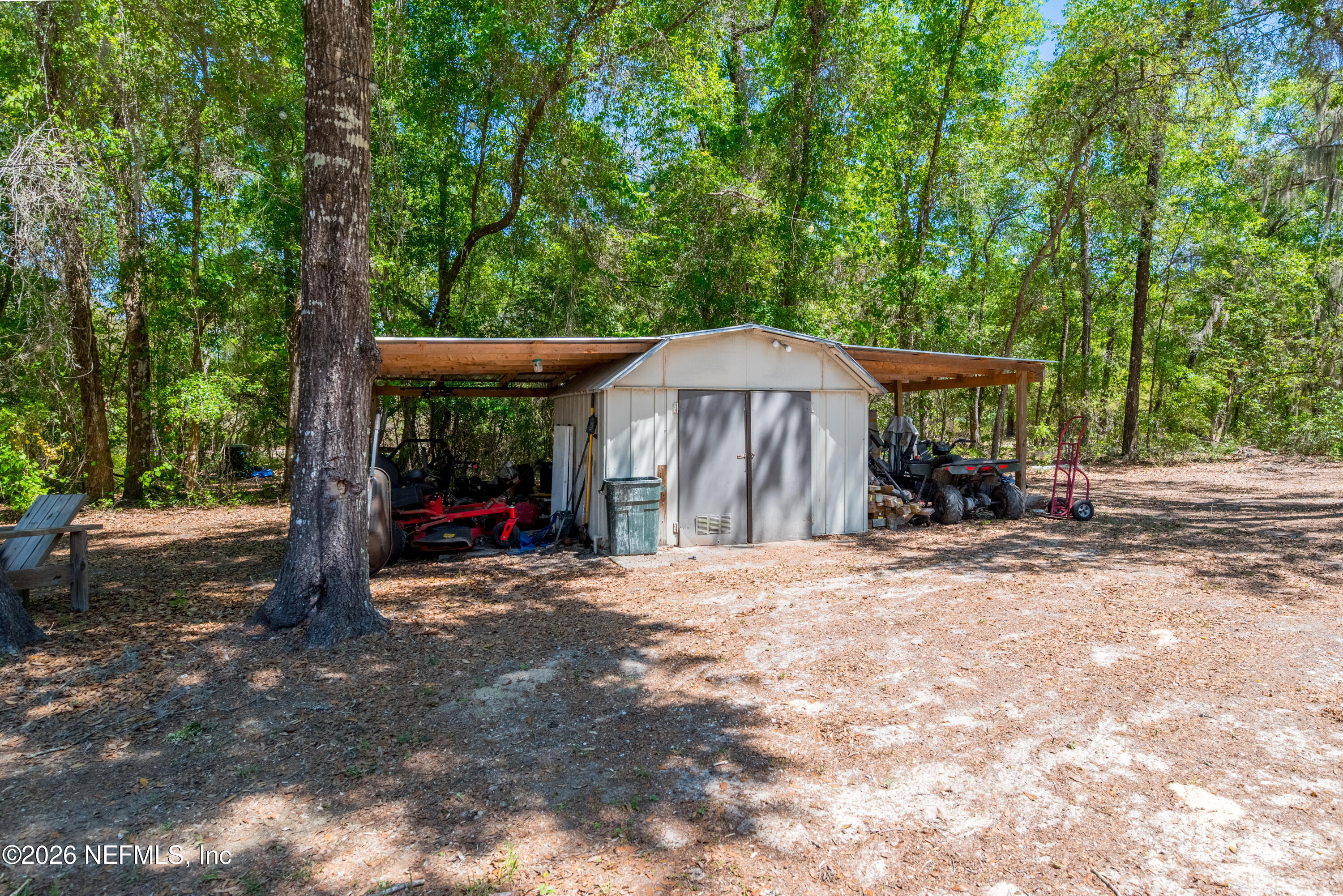 6519 Neale Road Melrose, FL 32666 - Photo 5 of 48 a view of a house with backyard and sitting area