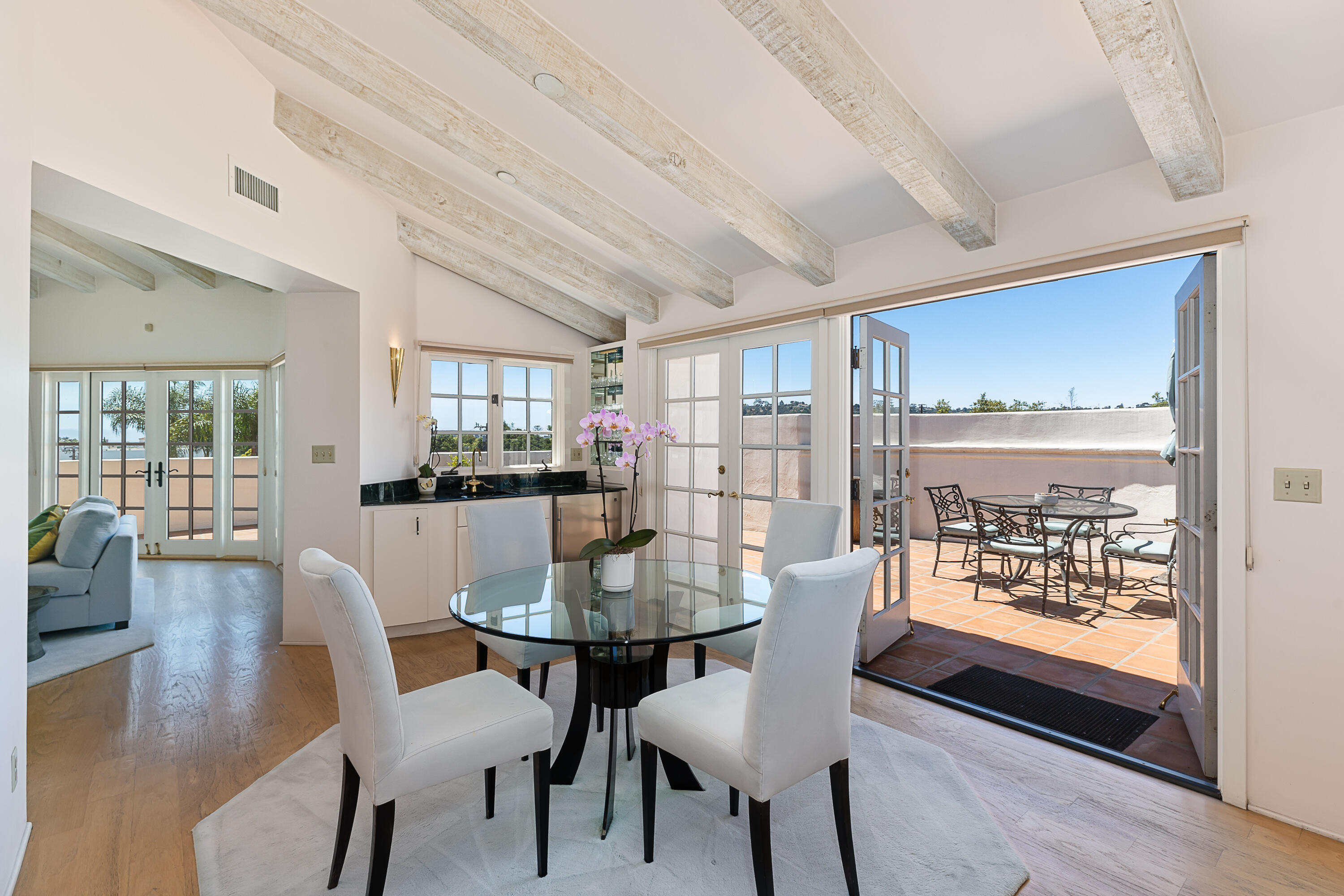 1525 State Street, Unit 306 Santa Barbara, CA 93101 - Photo 7 of 28 Formal Dining room w/ wet bar