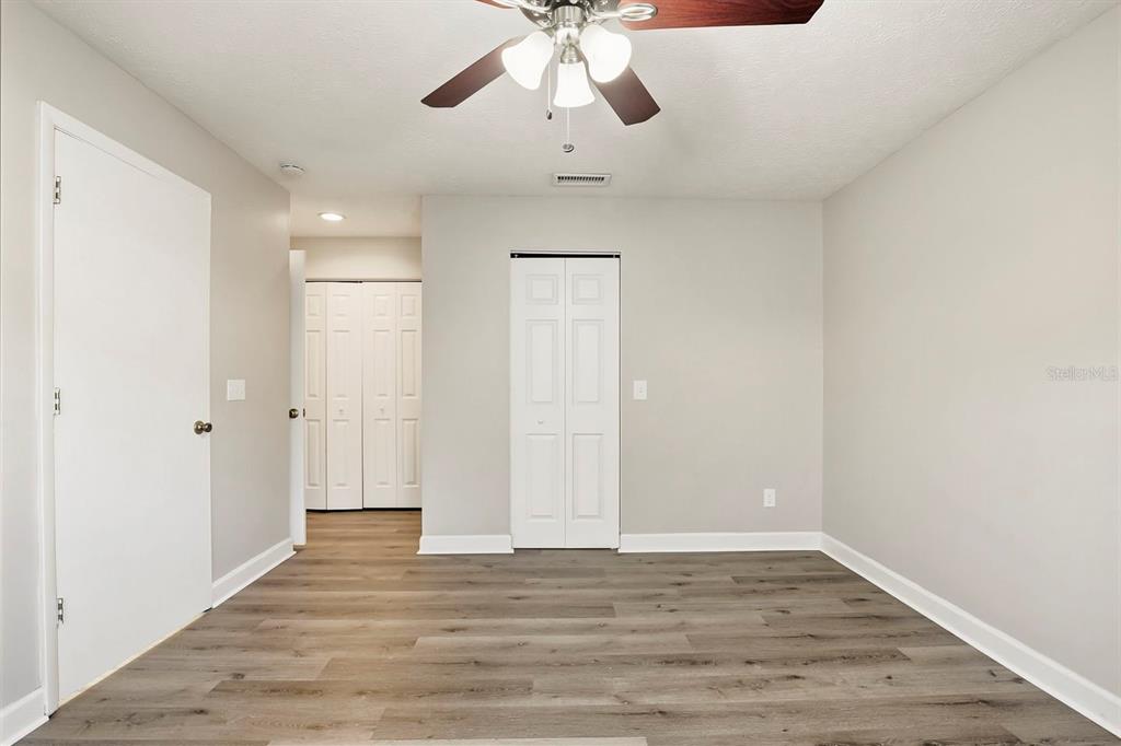 15009 Naples Place Tampa, FL 33624 - Photo 25 of 42 a view of an empty room with a window