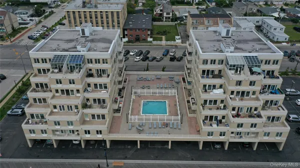 a view of building with parking space