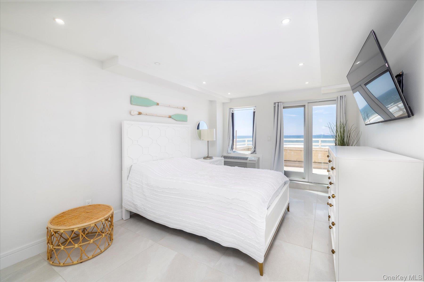 450 West Broadway, Unit 3F Long Beach, NY 11561 - Photo 10 of 23 Bedroom with Direct oceanfront views and Access to balcony. Walk in closet.