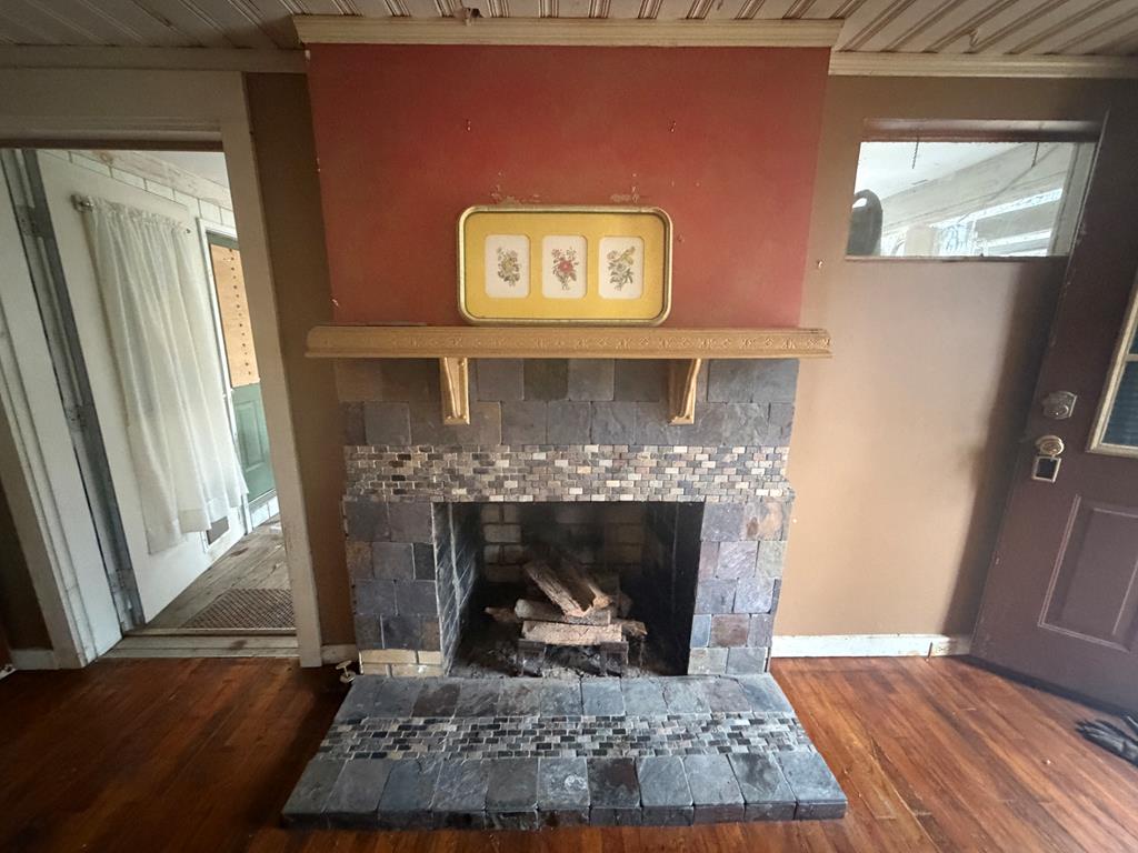 316 Lake Drive Morganton, GA 30560 - Photo 12 of 41 a living room with furniture and a fireplace