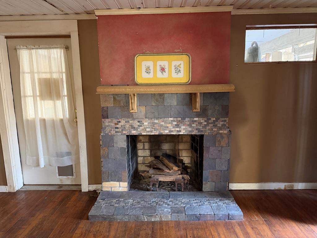 316 Lake Drive Morganton, GA 30560 - Photo 2 of 41 a view of a livingroom with fireplace and window