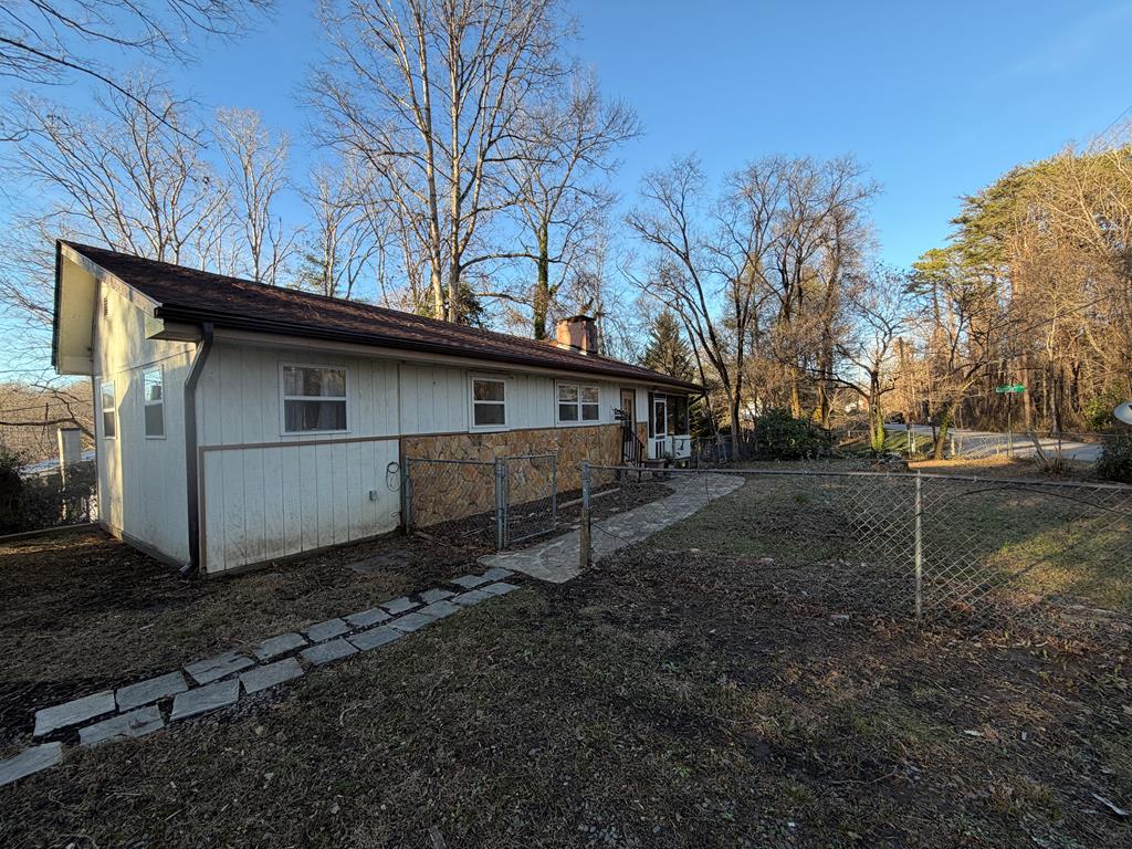316 Lake Drive Morganton, GA 30560 - Photo 22 of 41 a view of a house with a back yard