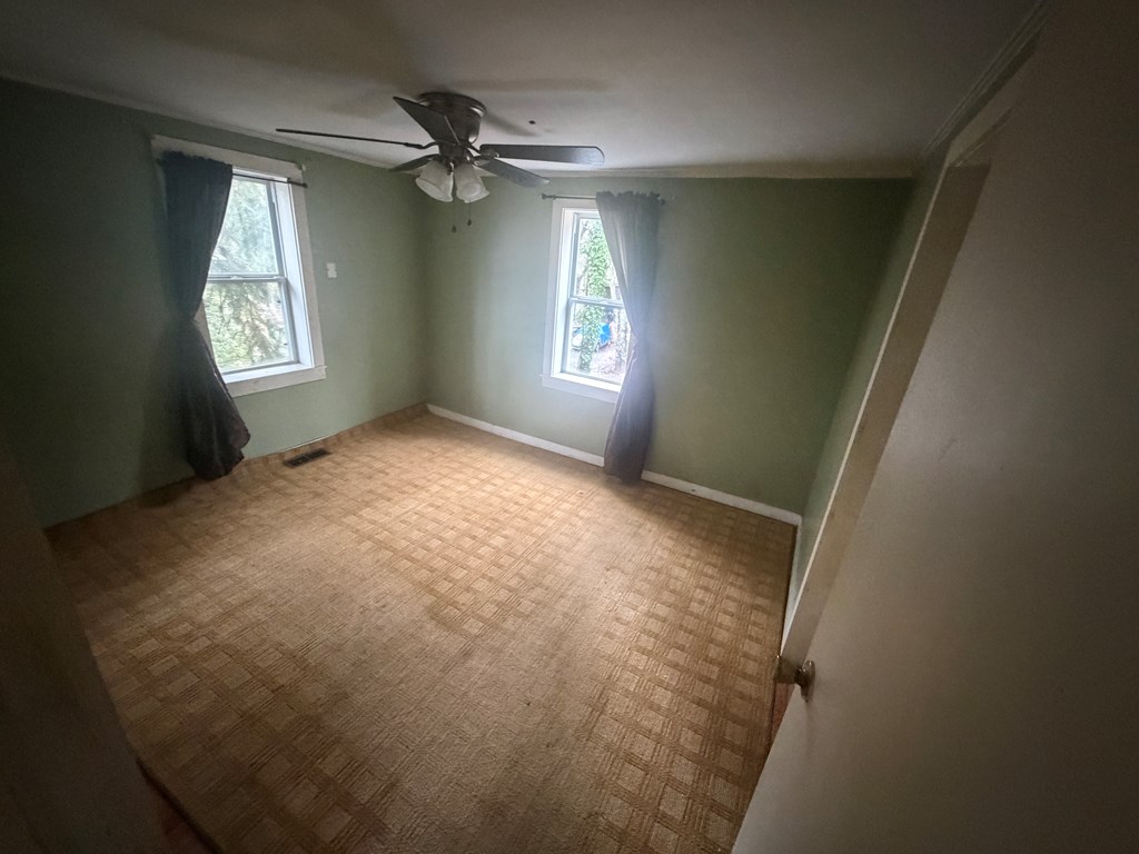 316 Lake Drive Morganton, GA 30560 - Photo 24 of 41 a view of an empty room and a windows