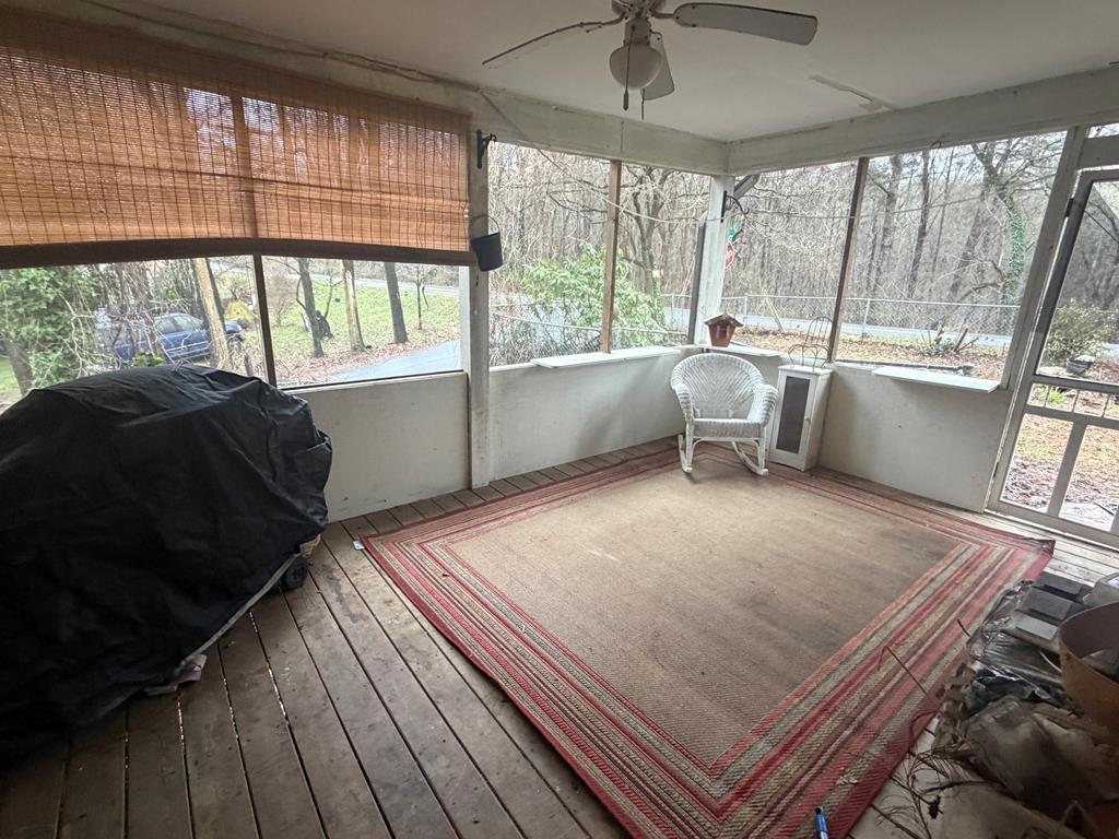 316 Lake Drive Morganton, GA 30560 - Photo 35 of 41 a bedroom with a bed and wooden floor