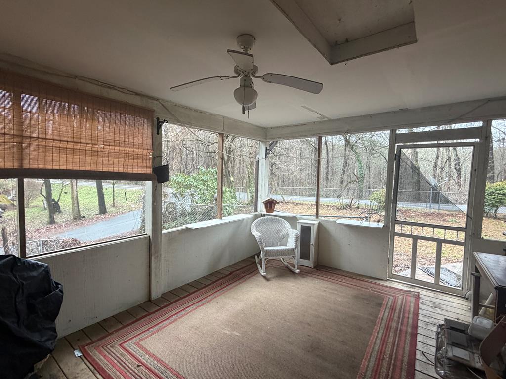 316 Lake Drive Morganton, GA 30560 - Photo 5 of 41 a living room with furniture and a large window