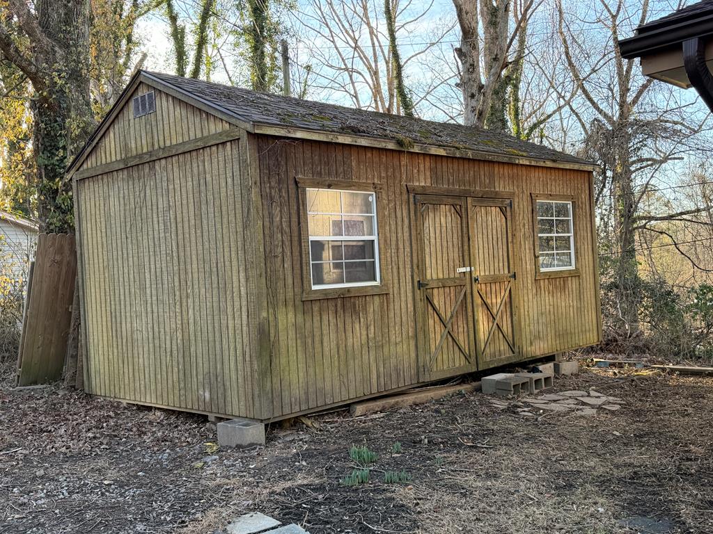 316 Lake Drive Morganton, GA 30560 - Photo 7 of 41 a view of a house with a wooden fence