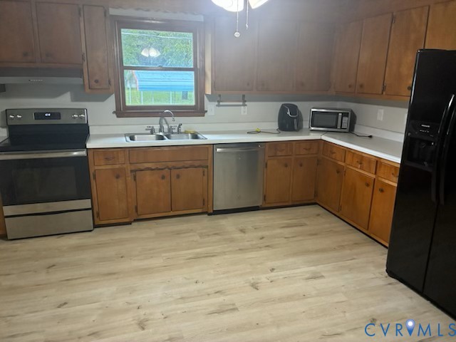 2000 Point Of Rocks Road Chester, VA 23836 - Photo 3 of 7 a kitchen with a sink cabinets and appliances