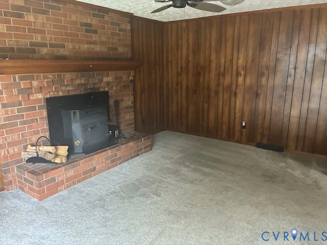 2000 Point Of Rocks Road Chester, VA 23836 - Photo 4 of 7 a view of an empty room with wooden floor and a fireplace