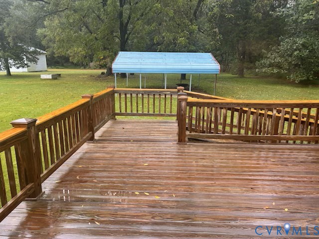 2000 Point Of Rocks Road Chester, VA 23836 - Photo 7 of 7 a balcony with wooden floor and outdoor space