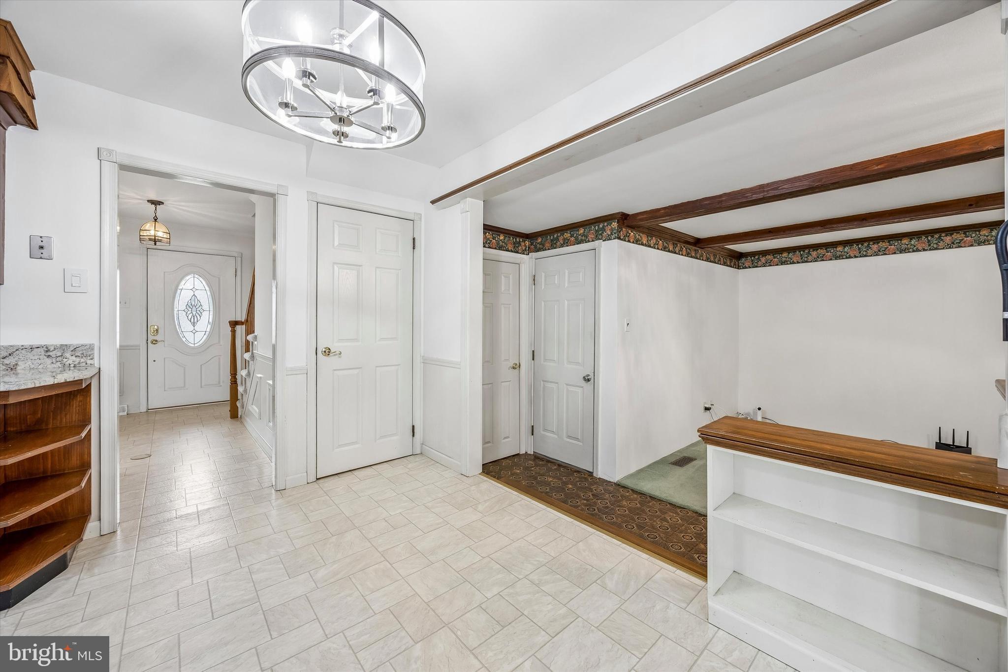 34 White Birch Road Blackwood, NJ 08012 - Photo 17 of 39 Door to basement & step down to half bath & den