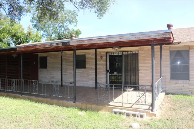 a view of backyard with green space