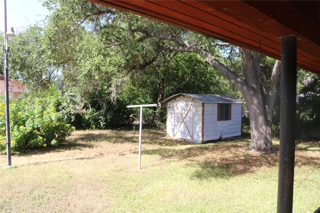 a room with gym equipment and a large window