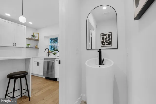 a very nice looking room with a chair and table