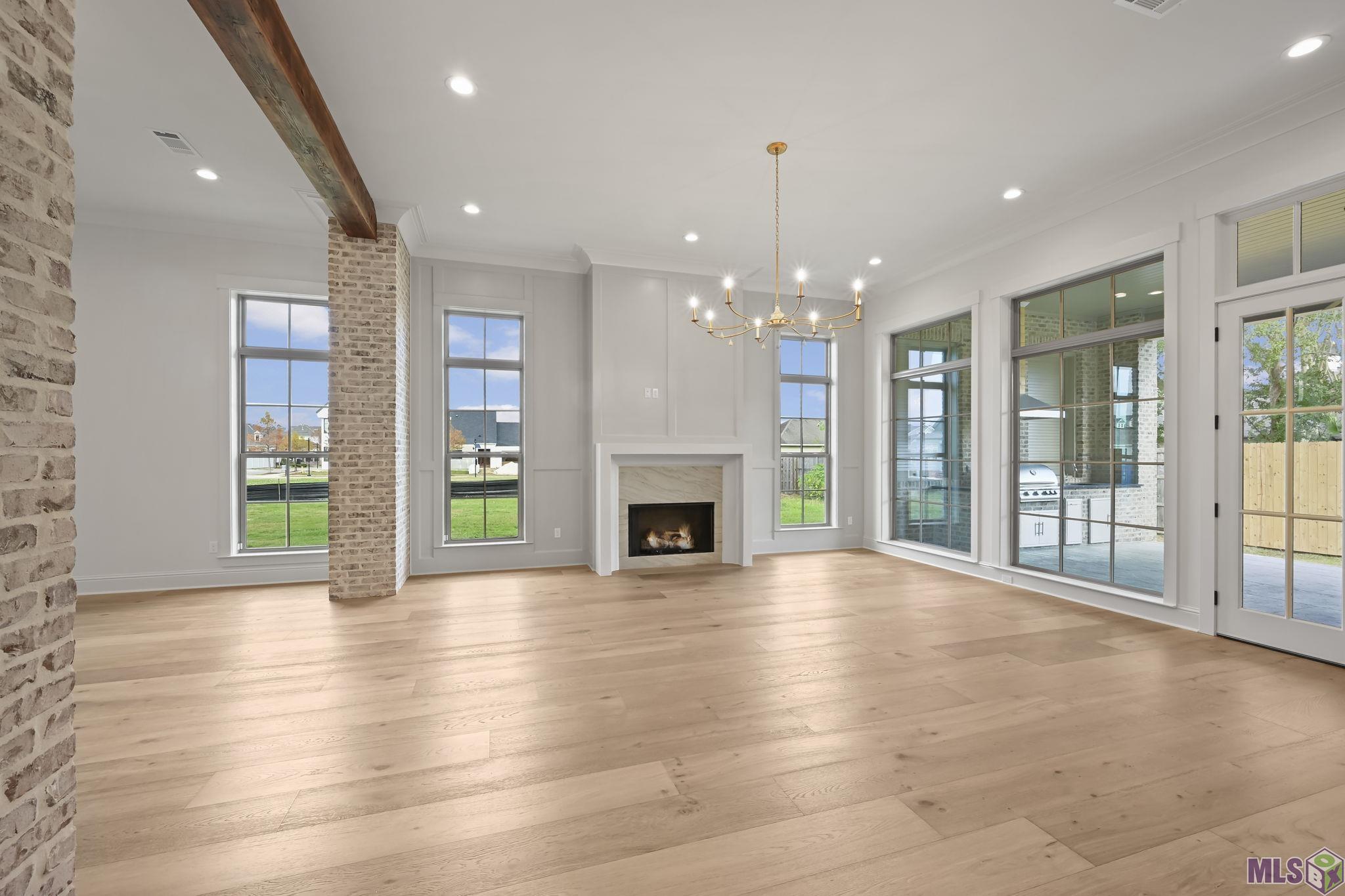 1752 Ville Marie Street Baton Rouge, LA 70808 - Photo 11 of 52 Living area with loads of light and views of back patio area