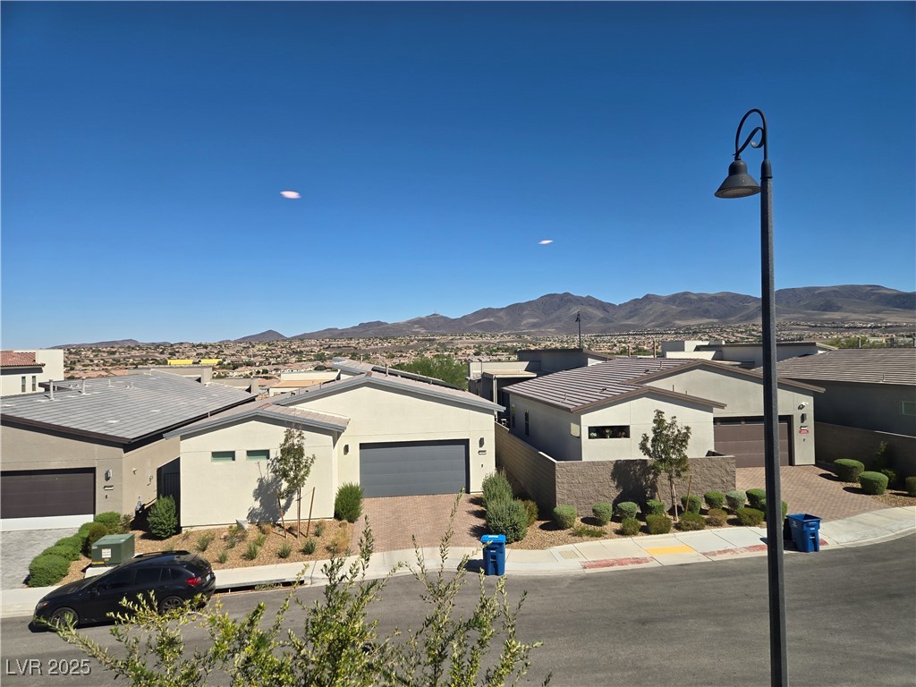 3192 Timorasso Avenue Henderson, NV 89044 - Photo 6 of 16 View of mountain background with nearby suburban area