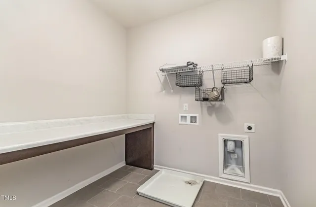 a view of small space with racks on the wall