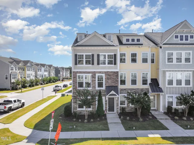 an aerial view of a house with a garden