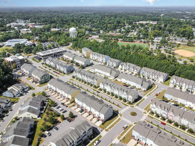 a view of a livingroom with furniture and windows