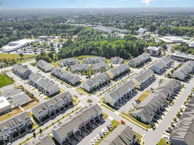 a front view of a building with garden