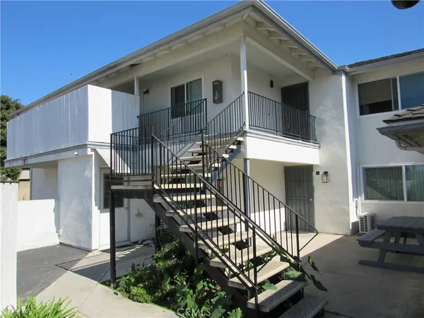 a front view of a house with balcony