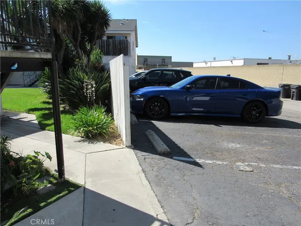 a view of a car parked in front of a house
