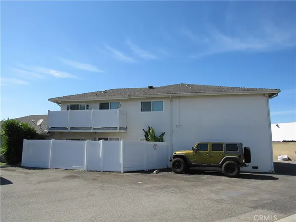a car parked in front of a house