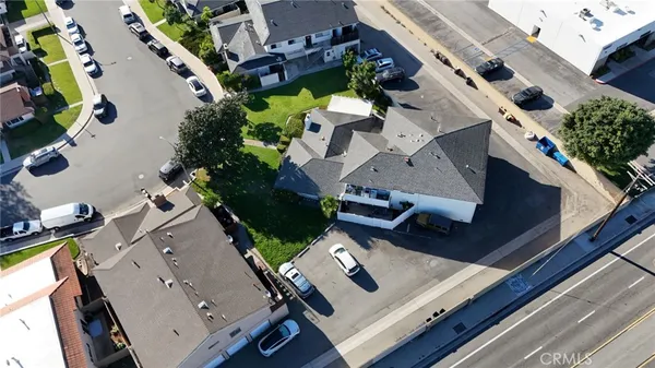 an aerial view of house with a yard