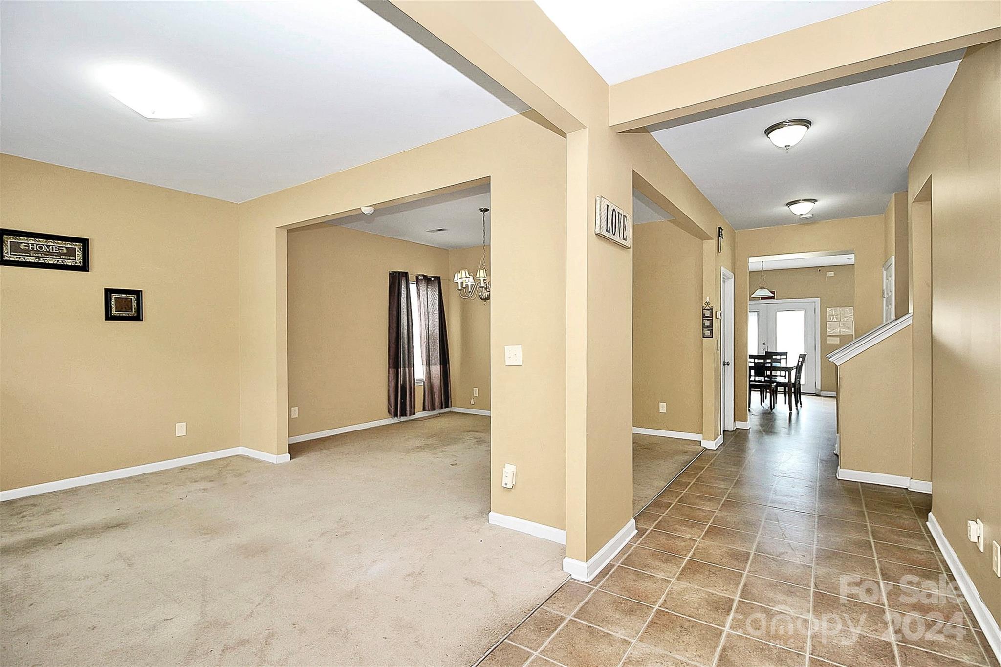 3416 Ashley View Drive Charlotte, NC 28213 - Photo 4 of 28 a view of a hallway with wooden floor
