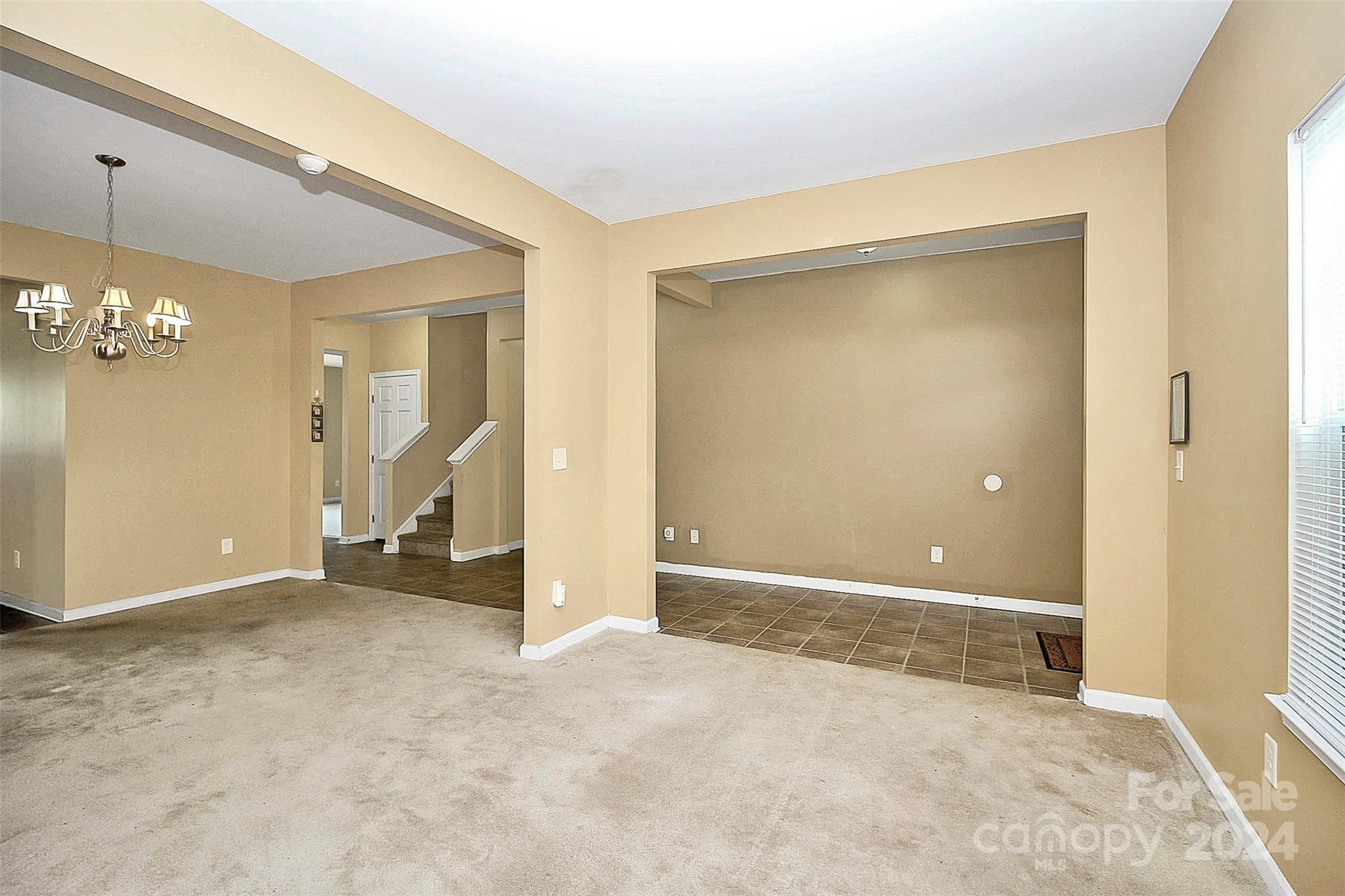 3416 Ashley View Drive Charlotte, NC 28213 - Photo 5 of 28 an empty room with a mirror