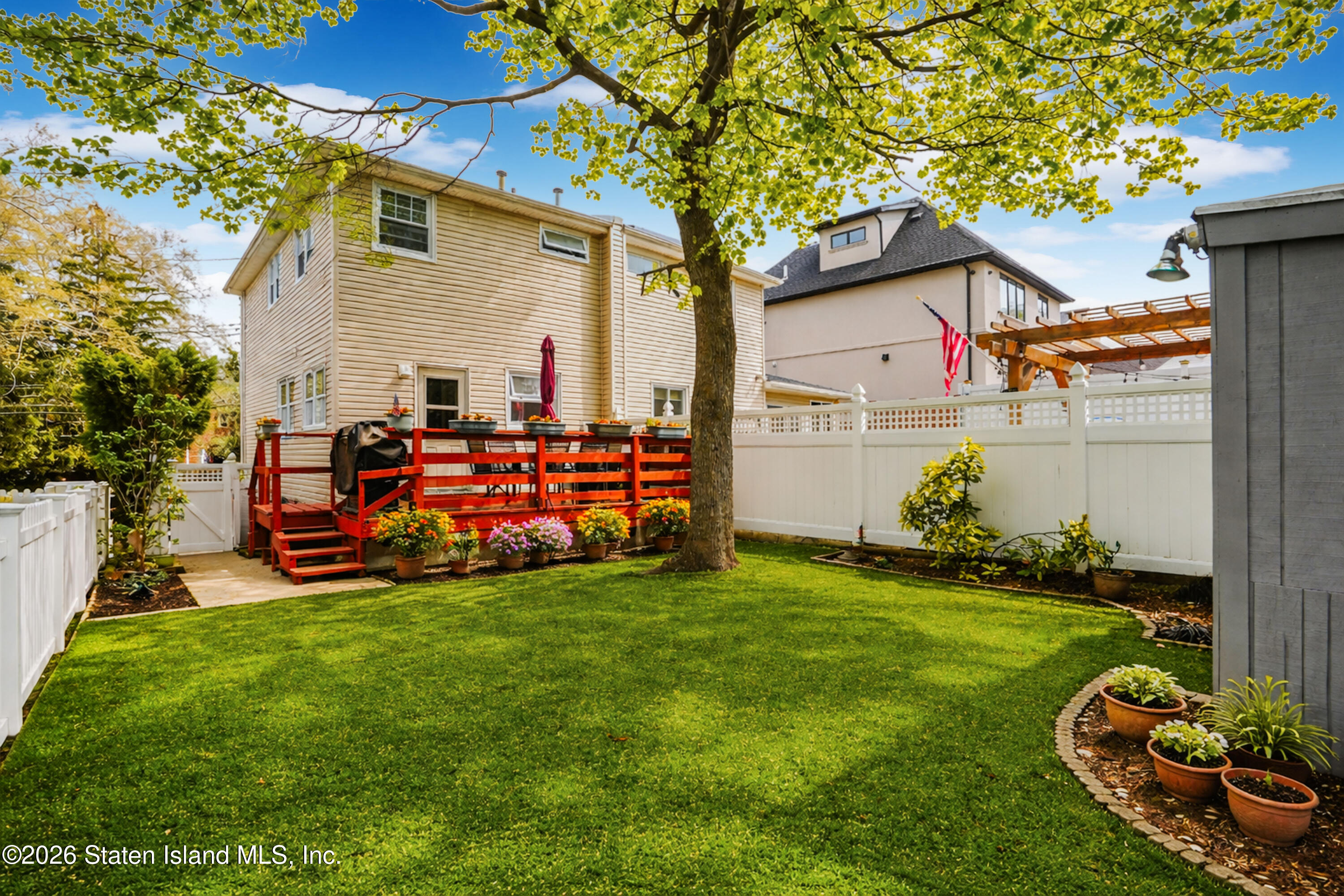 7750 Amboy Road Staten Island, NY 10307 - Photo 15 of 29 a view of a house with backyard