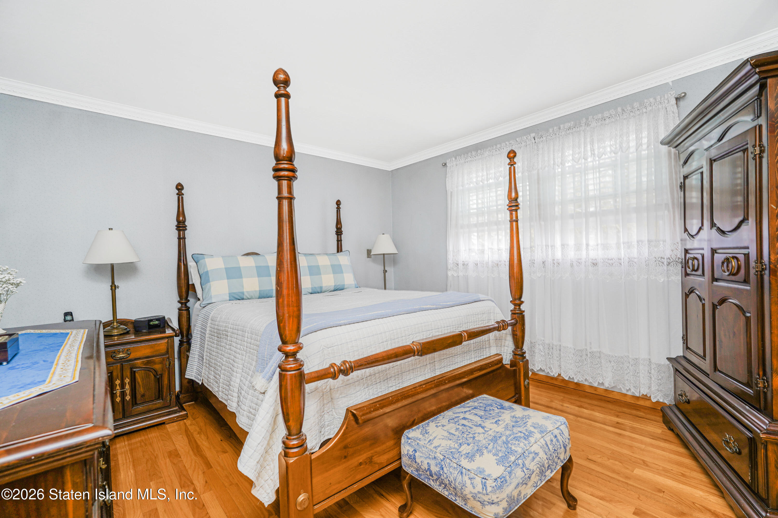 7750 Amboy Road Staten Island, NY 10307 - Photo 20 of 29 a bedroom with furniture and a rug