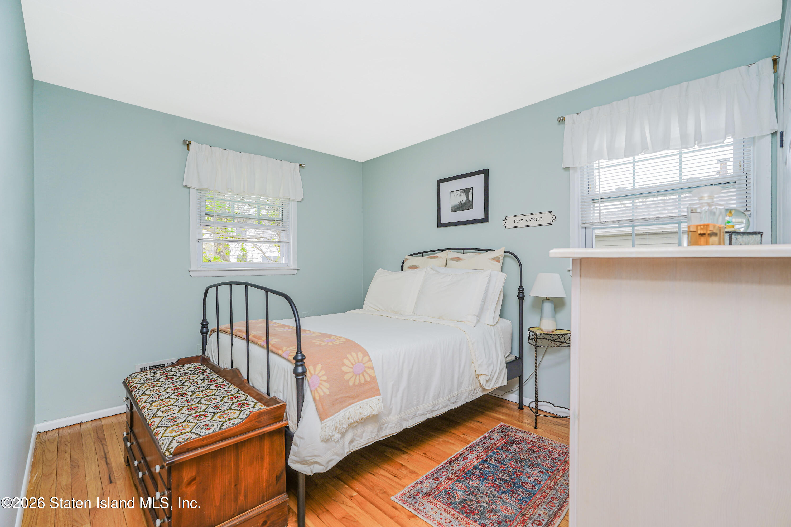 7750 Amboy Road Staten Island, NY 10307 - Photo 22 of 29 a bedroom with furniture and a window