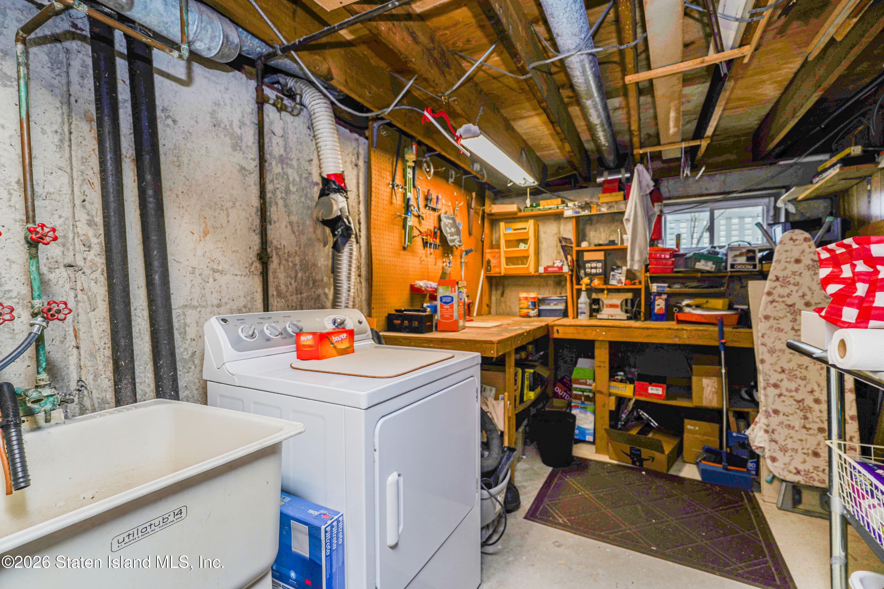 7750 Amboy Road Staten Island, NY 10307 - Photo 29 of 29 a utility room with dryer and washer