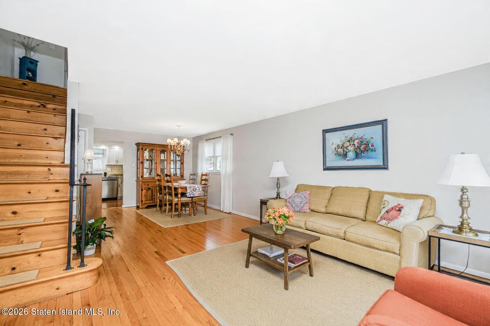 7750 Amboy Road Staten Island, NY 10307 - Photo 4 of 29 a living room with furniture and wooden floor