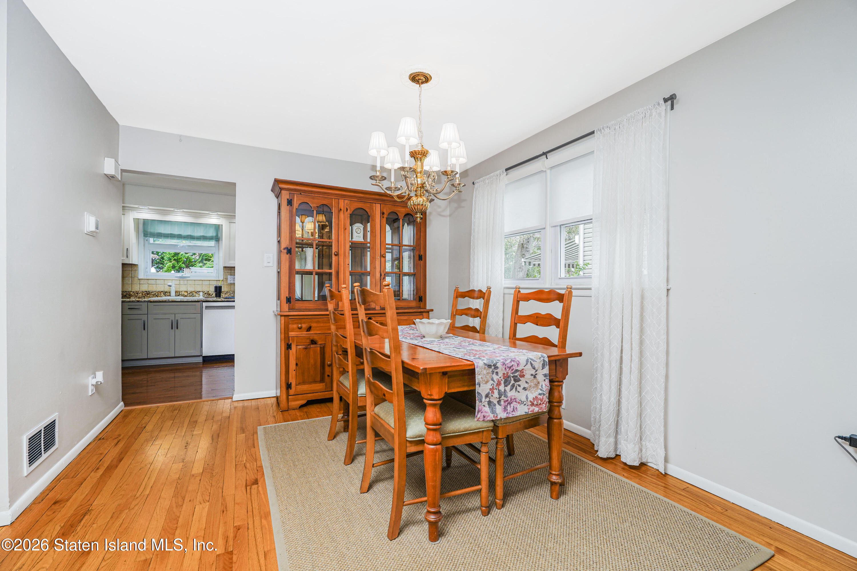 7750 Amboy Road Staten Island, NY 10307 - Photo 7 of 29 a dining room with furniture and window