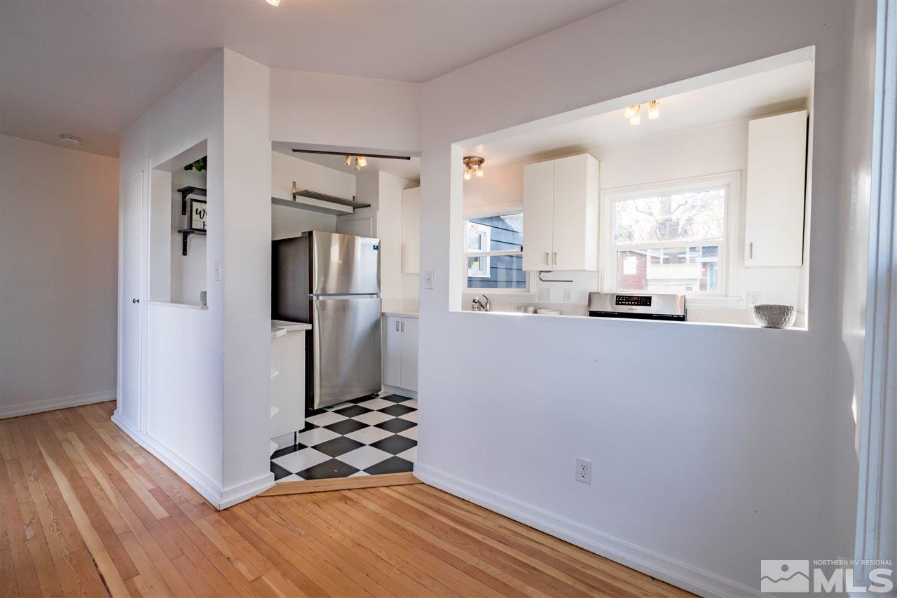 951 Watt Street Reno, NV 89509 - Photo 5 of 11 a kitchen with stainless steel appliances a refrigerator and a stove