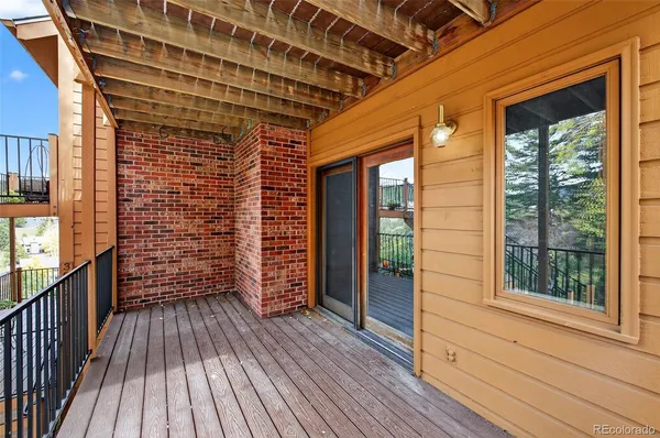 a view of outdoor space with wooden deck