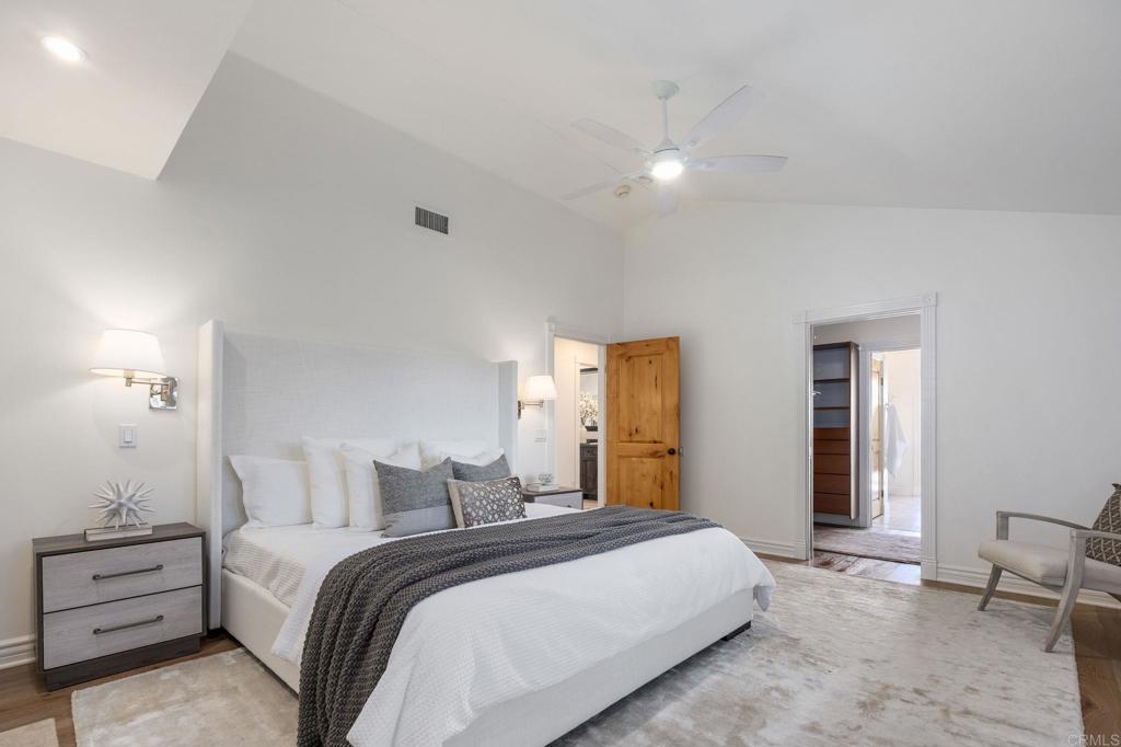 371 La Mesa Avenue Encinitas, CA 92024 - Photo 18 of 30 a bedroom with a bed and a window