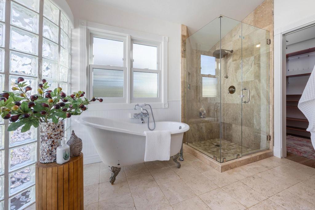 371 La Mesa Avenue Encinitas, CA 92024 - Photo 20 of 30 a bathroom with a shower sink and a mirror