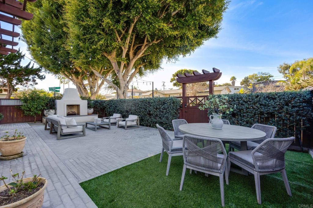 371 La Mesa Avenue Encinitas, CA 92024 - Photo 6 of 30 a view of a patio with furniture and a fire pit