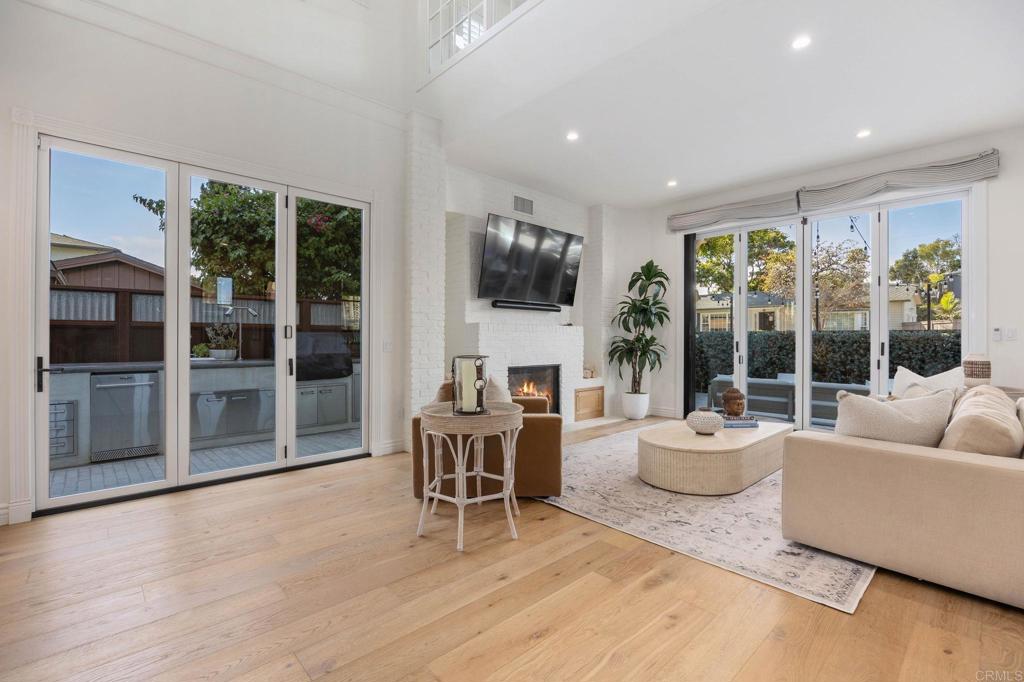 371 La Mesa Avenue Encinitas, CA 92024 - Photo 7 of 30 a living room with furniture and a flat screen tv