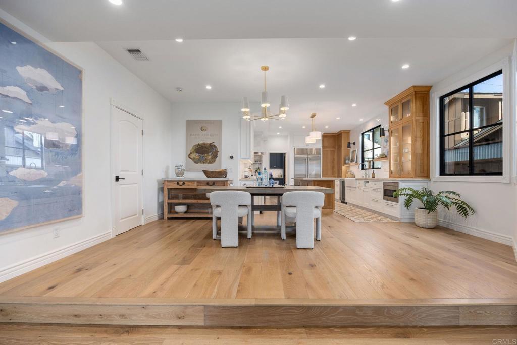 371 La Mesa Avenue Encinitas, CA 92024 - Photo 8 of 30 a very nice looking living room with kitchen and a couch